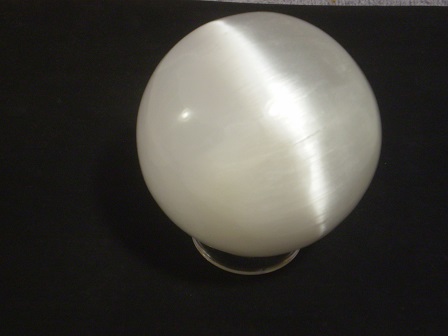 Fiber optic selenite sphere, 80 mm (3+<sup>7</sup>/<sub>32</sub> inches) diameter.